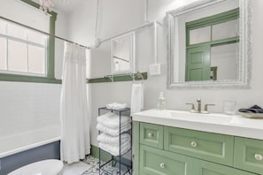 Shower, hair dryer, towels