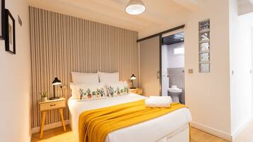 1 dormitorio, tabla de planchar con plancha, wifi gratis y ropa de cama