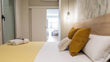 2 dormitorios, tabla de planchar con plancha, wifi gratis y ropa de cama