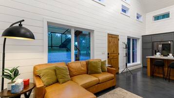 Smart TV, fireplace, foosball, books