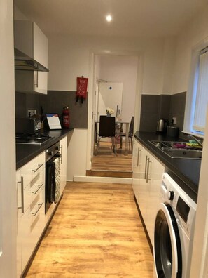 House, Multiple Beds | Private kitchen