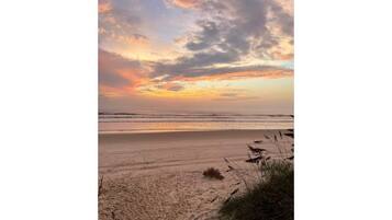 On the beach, sun loungers, beach towels