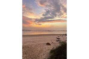 On the beach, sun-loungers, beach towels