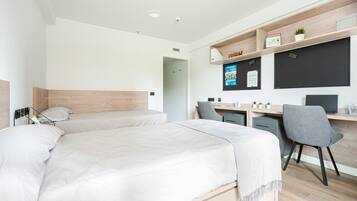 Basic Double or Twin Room | Desk, laptop workspace, free WiFi, bed sheets