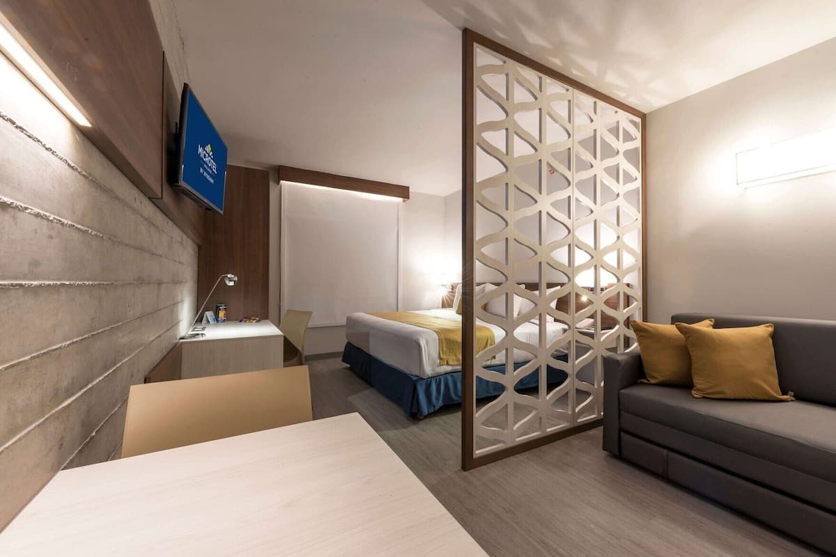 In-room safe, desk, blackout curtains, iron/ironing board (on request)