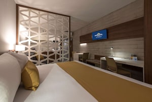 Suite, 1 King Bed, Non Smoking | In-room safe, desk, blackout drapes, iron/ironing board
