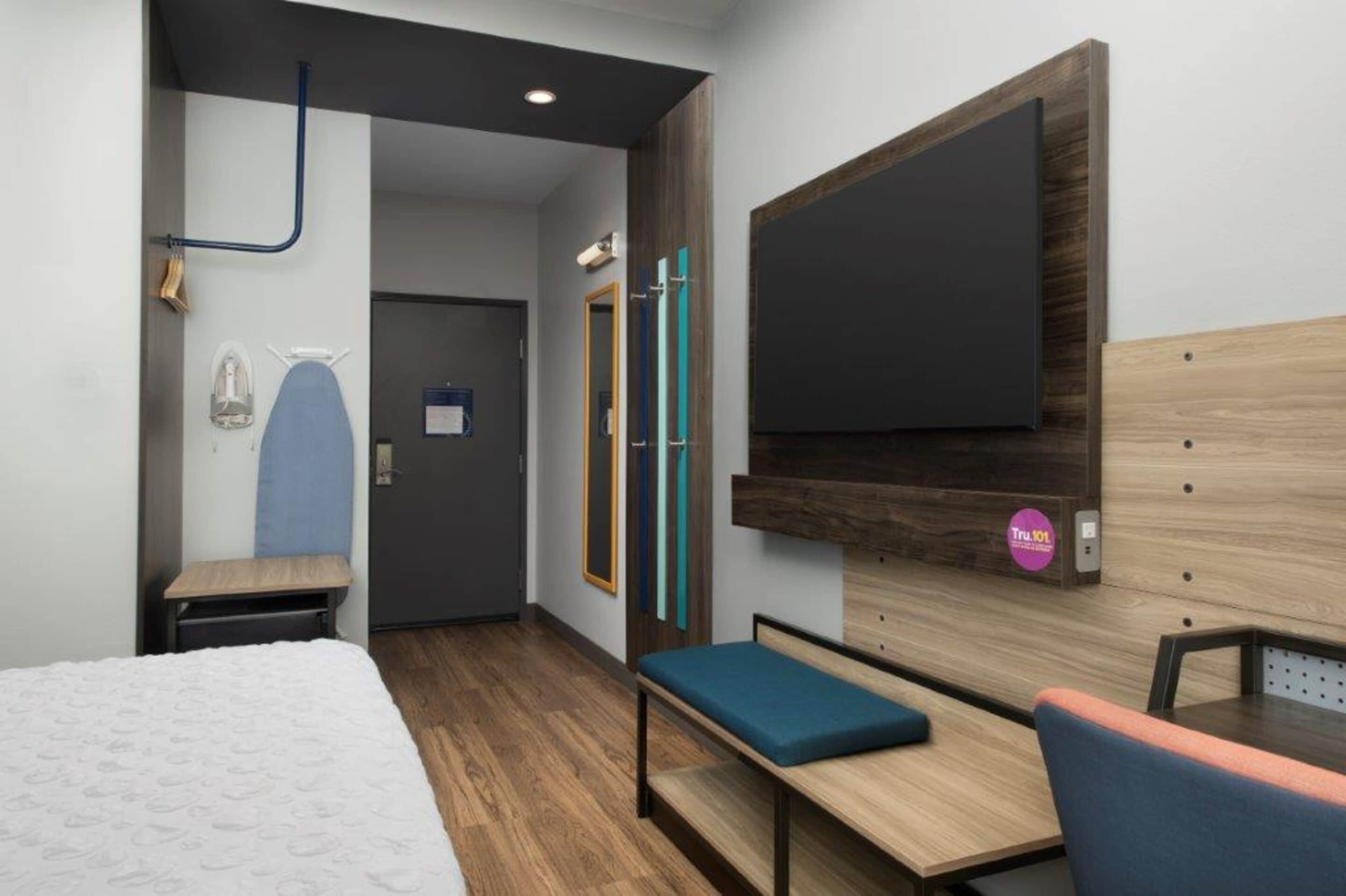 desk, laptop workspace, blackout curtains, iron/ironing board