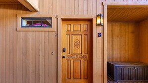 A wooden door with a window above it and a number "3" on the wall. - Interlaken 3, one bedroom getaway (June Lake)