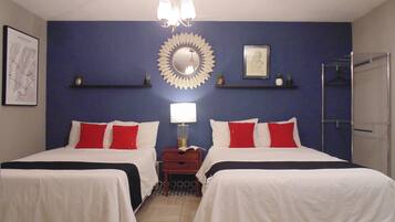 Classic Quadruple Room | Down comforters, minibar, individually decorated, individually furnished