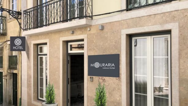 A hotel entrance with a sign for "MOURARIA Lisboa Hotel" and a "HOTEL" sign above it. - Mouraria Lisboa Hotel (Lisbon)