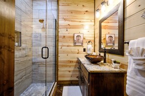 Combined shower/tub, hair dryer, towels, soap