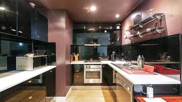 Fridge, coffee/tea maker, highchair, cookware/dishes/utensils