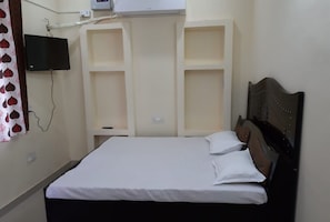 Egyptian cotton sheets, premium bedding, down duvets, memory-foam beds