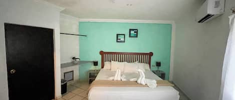 Deluxe Studio Suite, 1 King Bed | Individually decorated, individually furnished, free WiFi, bed sheets