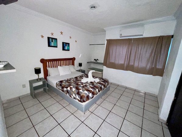 Deluxe Studio Suite, 1 Double Bed | Individually decorated, individually furnished, free WiFi, bed sheets