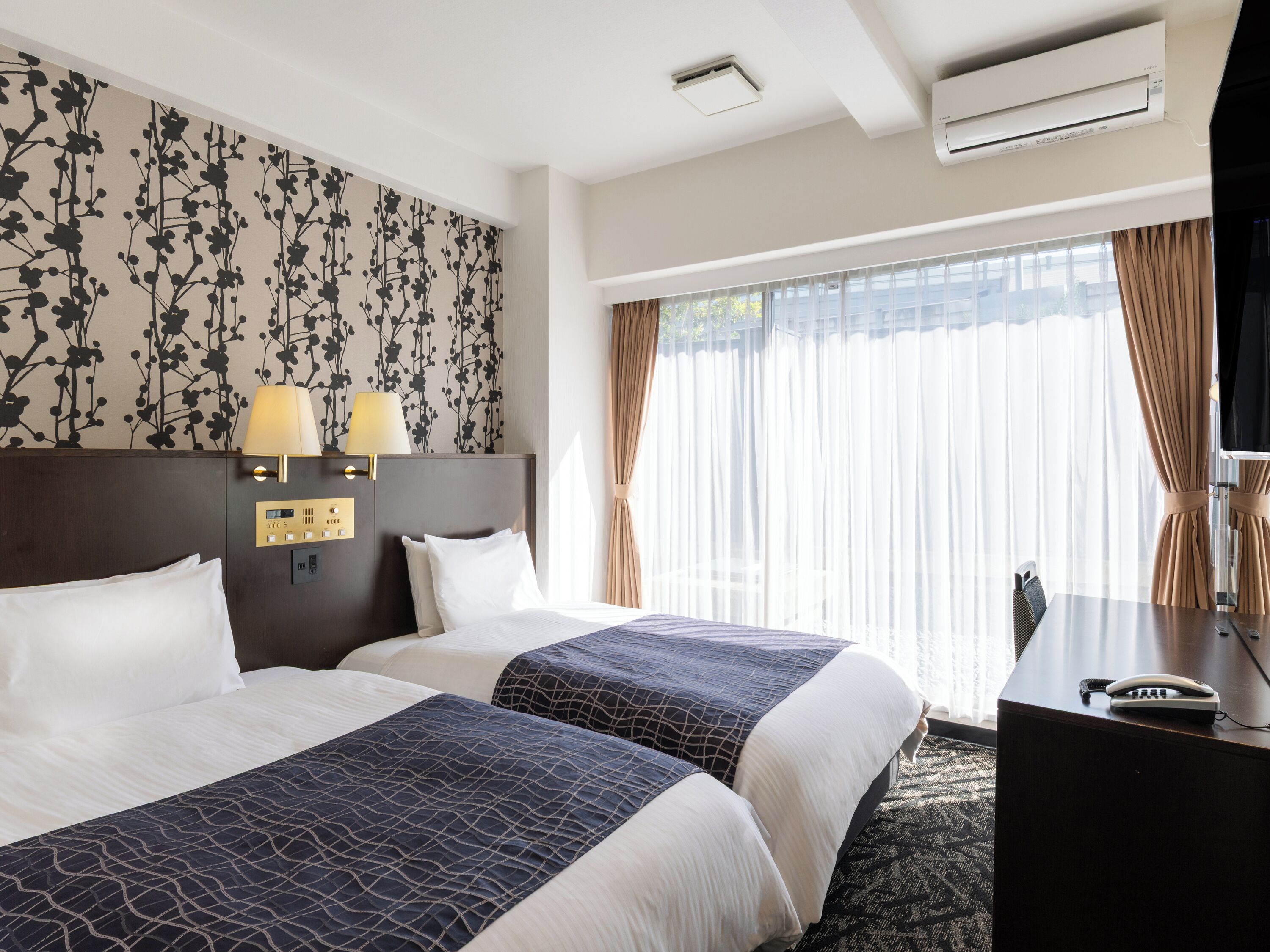 Twin Room, Non Smoking | Blackout drapes, free WiFi, bed sheets