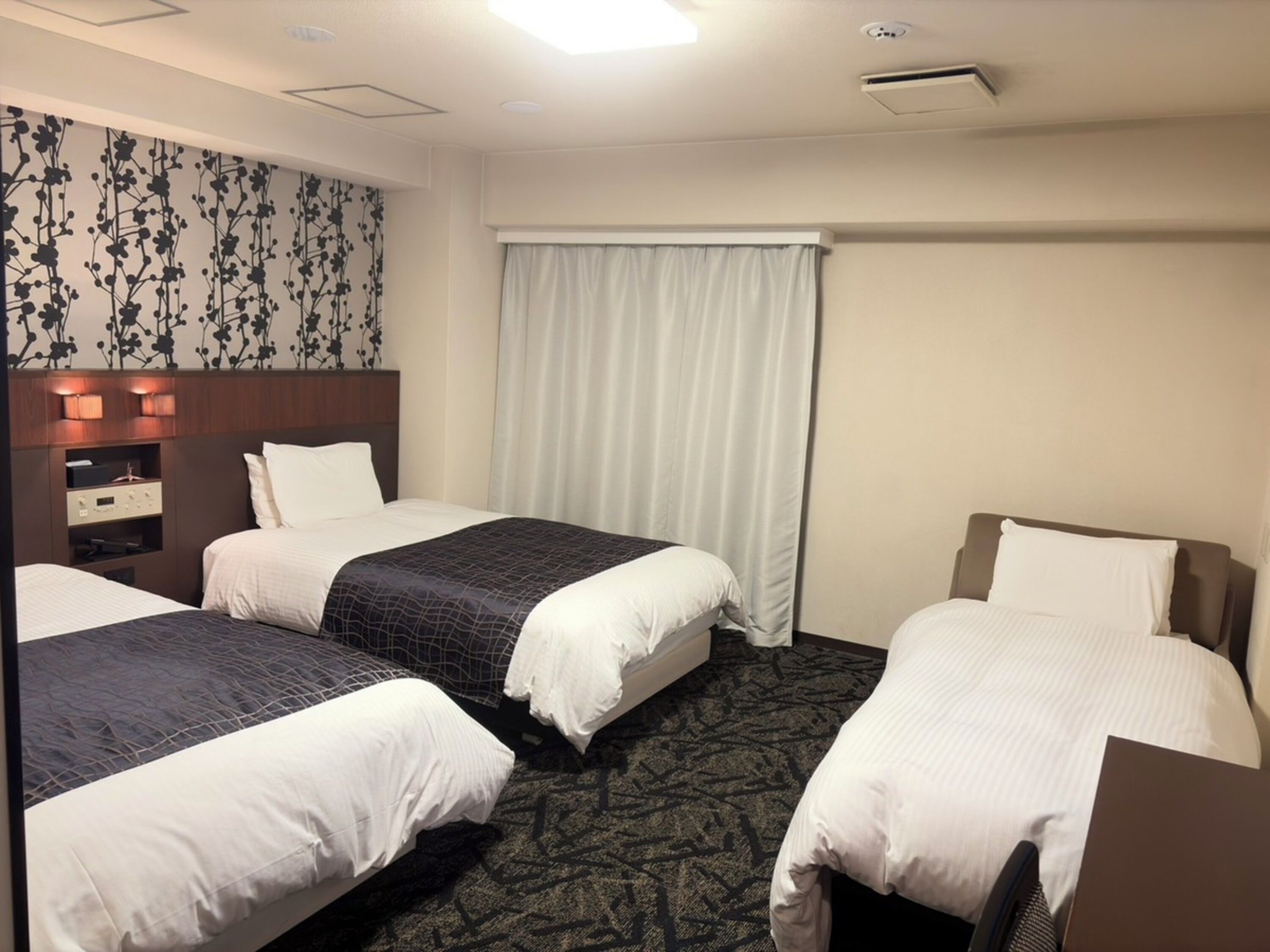 Desk, blackout curtains, free WiFi, bed sheets