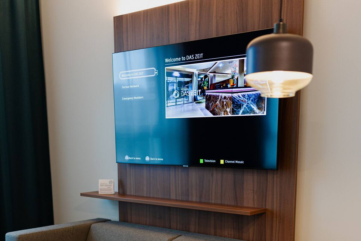 junior suite | 1 bedroom, in-room safe, desk, blackout curtains