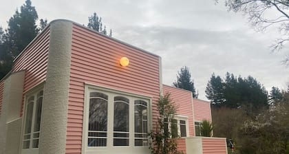 The chic, pink house on the Alpine Pacific Leader Road.