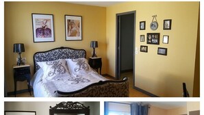 A hotel room with a bed, bedside tables, a mirror, a sink, and a window with curtains. - Beautiful house in the country (LE FRAYSSE)