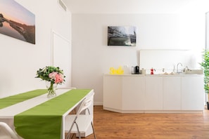 Apartamento standard, 1 quarto | Área de estar