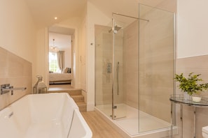 Bathtub, hair dryer, towels, soap