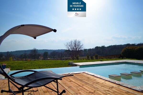 Alberca al aire libre y alberca climatizada