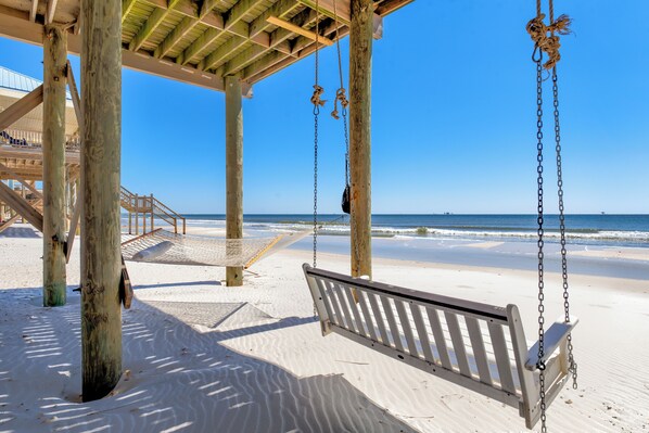 On the beach, sun loungers