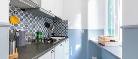 Design Apartment | Private kitchen | Fridge, stovetop, cookware/dishes/utensils, freezer