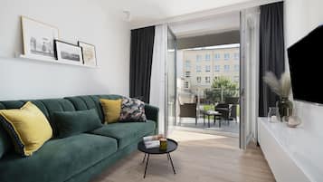 Design appartement | Woonkamer | Een 50-inch smart-tv met digitale zenders en een televisie
