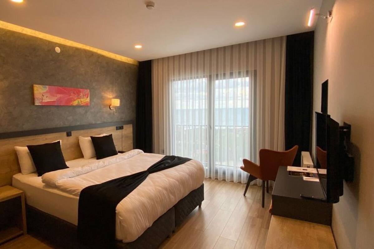 Hochwertige Bettwaren, Minibar (mit einigen kostenlosen Artikeln)