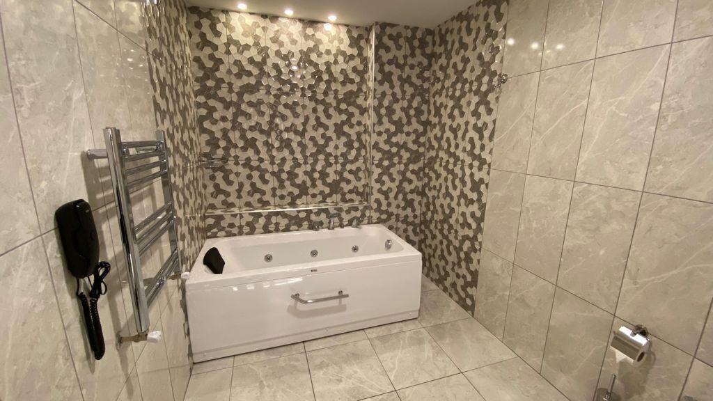 family room | bathroom | free toiletries, hair dryer, slippers, towels