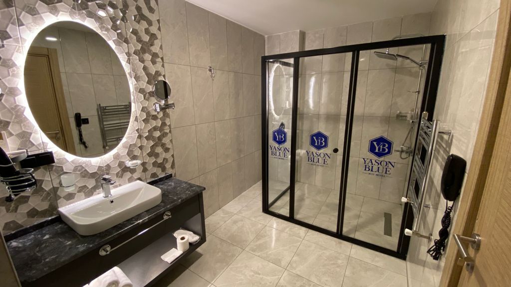 suite | bathroom | free toiletries, hair dryer, slippers, towels