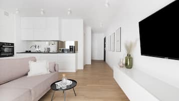 Apartamento design | Sala de estar | TV de tela plana
