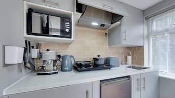 Fridge, microwave, toaster, cookware/dishes/utensils