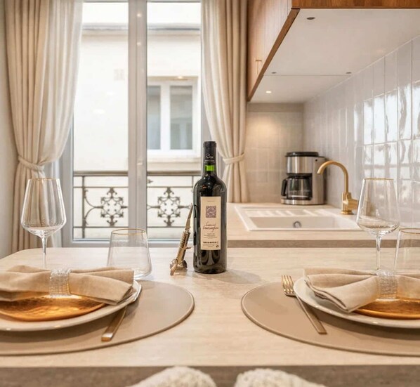 Fridge, microwave, stovetop, coffee/tea maker