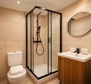 Shower, hair dryer, towels, soap