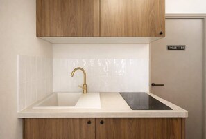 Fridge, microwave, stovetop, coffee/tea maker