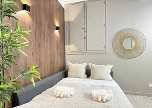 Iron/ironing board, travel crib, bed sheets