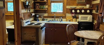 A Unique Bed and Breakfast...Log Cabins, with Hot Tubs and Breakfast Delivered Each Morning :)