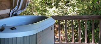 A Unique Bed and Breakfast...Log Cabins, with Hot Tubs and Breakfast Delivered Each Morning :)