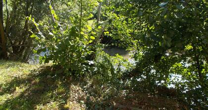 In an old mill studio by the river in the heart of the park of the perche