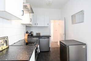 Appartamento Deluxe, 3 camere da letto, non fumatori, cucina | Cucina privata | Frigorifero, bollitore elettrico, tostapane, tavolo da pranzo