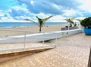 On the beach, sun loungers, beach towels