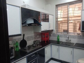 Fridge, microwave, oven, electric kettle - 2BR Modern & Luxury New Furnished House (Lahore)