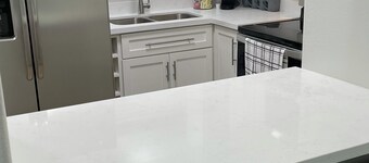 Modern Spacious Condo- Centrally Located! 