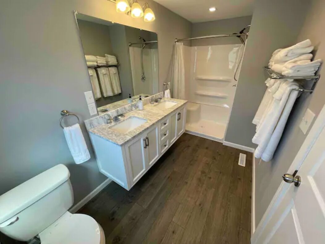 Combined shower/tub, hair dryer, towels, soap