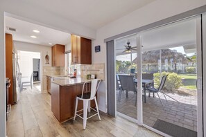 Fridge, microwave, oven, stovetop - Coastal Pool Home โ Heated Pool, Outdoor Lounge, Beach Gear & Short Drive to IRB (Seminole)