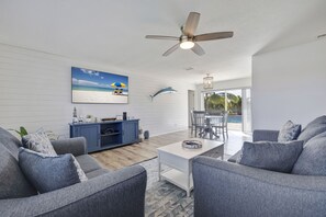 TV - Coastal Pool Home – Heated Pool, Outdoor Lounge, Beach Gear & Short Drive to IRB (Seminole)