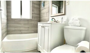 Shower, towels, soap, toilet paper